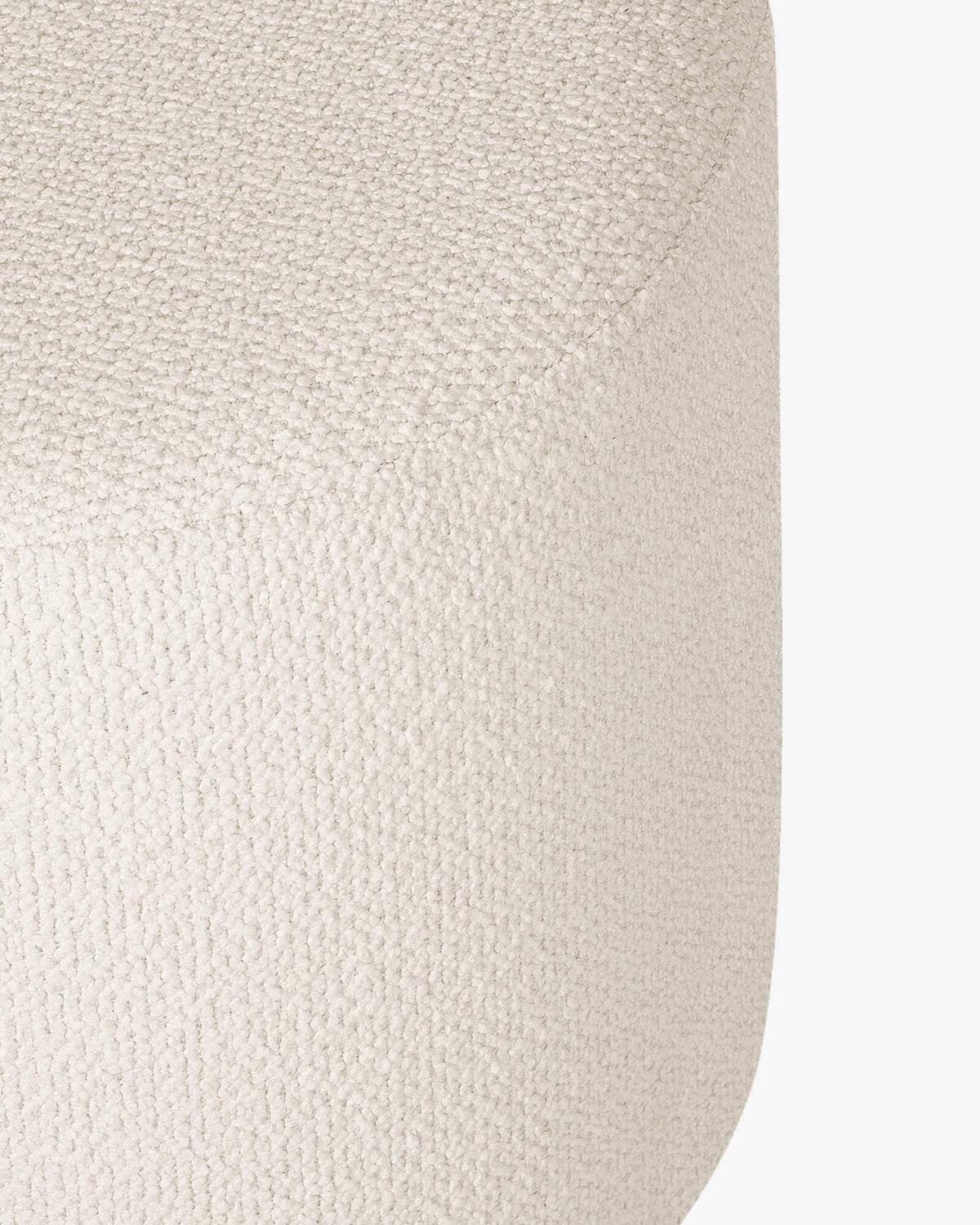 Close-up of the beige bouclé fabric texture
