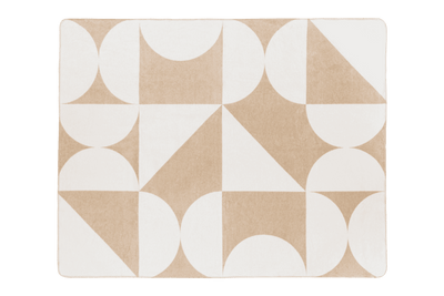 Packshot of a beige and white geometric patterned throw blanket.